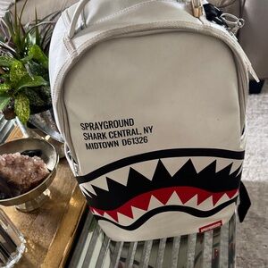 Sprayground White and Black Shark Backpack